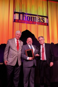 Dean August accepting award at 2019 Thomas Built Buses’ Dealer Meeting 